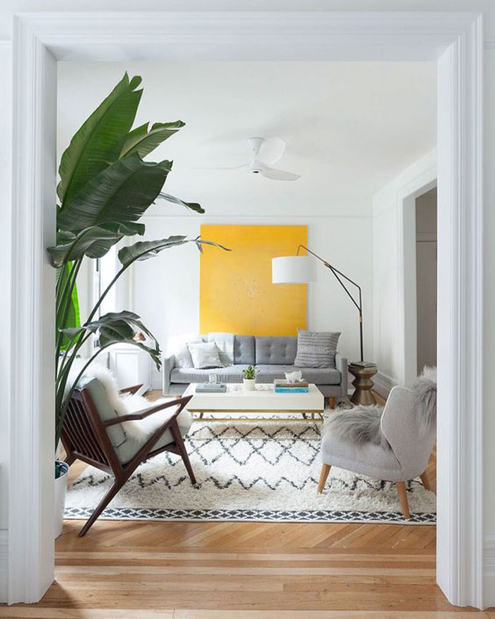 living room elm west budget friendly interior apartment grey couch sofa furniture desk rental decorating yellow space